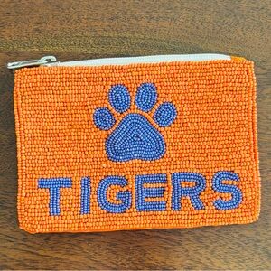 Orange Beaded Pouch with Purple Paw Design. Great for Clemson fans!